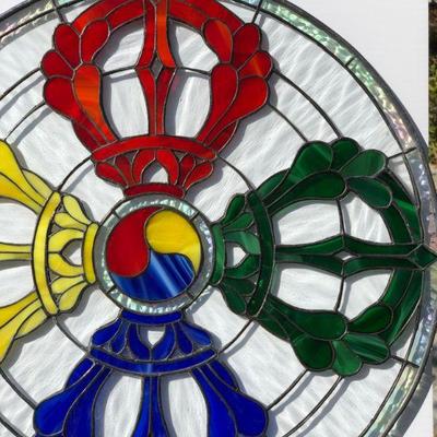 Striking Multi Color Stained Glass Window featuring Red Yellow Green and Blue