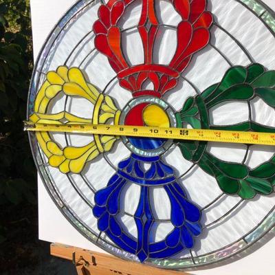 Striking Multi Color Stained Glass Window featuring Red Yellow Green and Blue