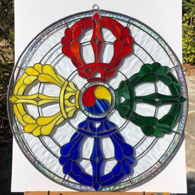 Striking Multi Color Stained Glass Window featuring Red Yellow Green and Blue