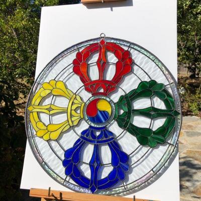 Striking Multi Color Stained Glass Window featuring Red Yellow Green and Blue