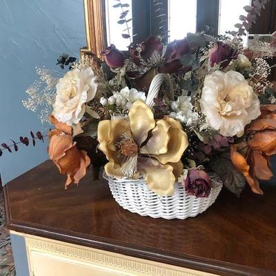 Wicker baskets with artificial flowers