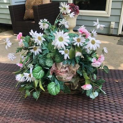 Wicker baskets with artificial flowers