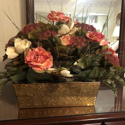 Wicker baskets with artificial flowers