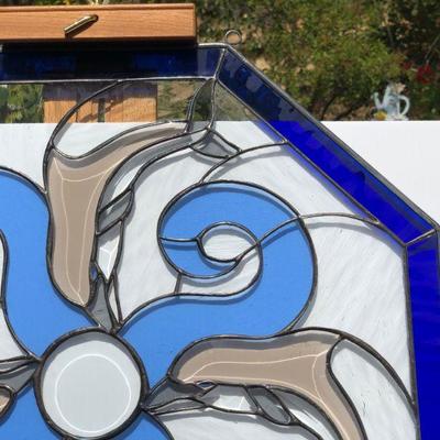 Blue Octagon Stained Glass of Dolphins Swimming in Waves