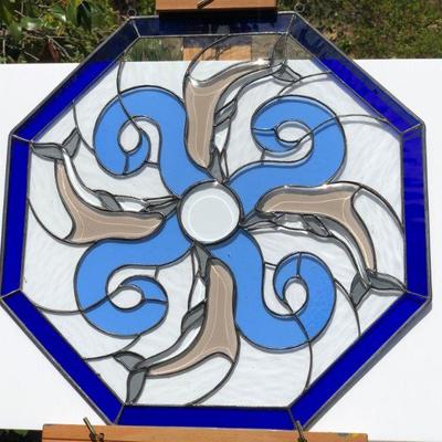 Blue Octagon Stained Glass of Dolphins Swimming in Waves
