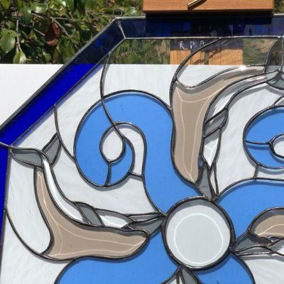 Blue Octagon Stained Glass of Dolphins Swimming in Waves