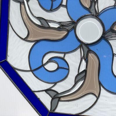Blue Octagon Stained Glass of Dolphins Swimming in Waves