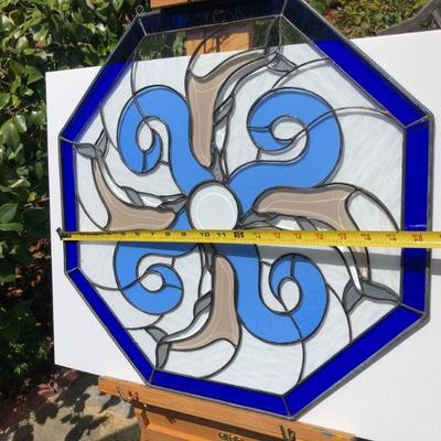 Blue Octagon Stained Glass of Dolphins Swimming in Waves
