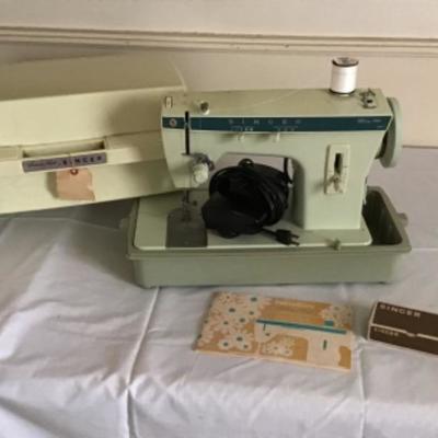 LOT # 528 Vintage Singer Sewing Machine with Fabric 