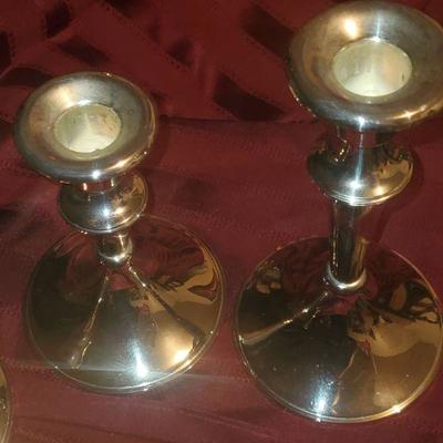 3 Silver tone candle sticks