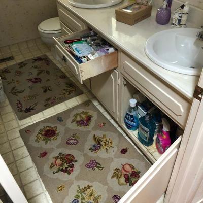 Lot 210 Contents of Hall Bathroom Cupboards & Rugs