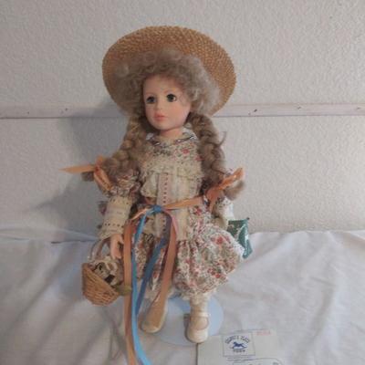 Collectible Porcelain Doll and Stand