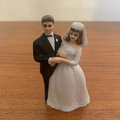 Lot 18 - Vintage Wedding Cake Topper and Baby Book