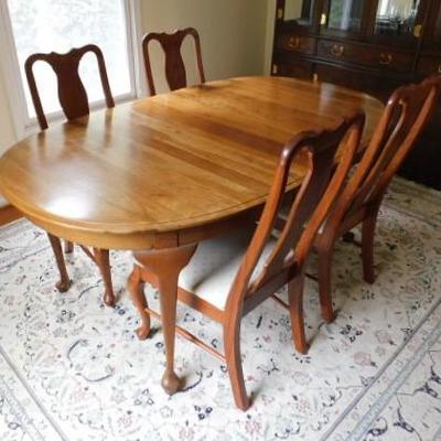 Formal Solid Wood Dining Table with 8 Chairs including Two Leaves