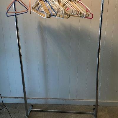 #167 Adjustable Clothes Rack with hangers 