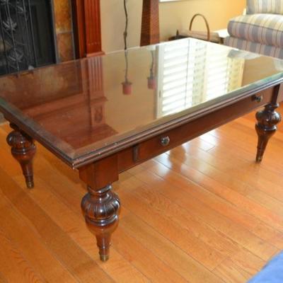 Lot 11. Ethan Allen wood coffee table with glass top