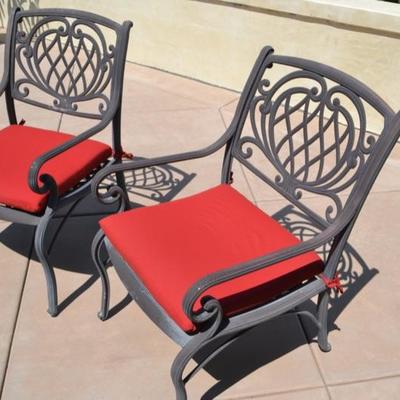 Lot 19. Pair of metal patio arm chairs