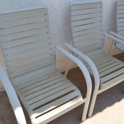Lot 30  4 strap patio chairs