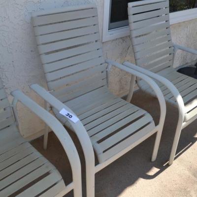 Lot 30  4 strap patio chairs