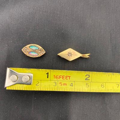 .16. Two Watch Fob Pieces