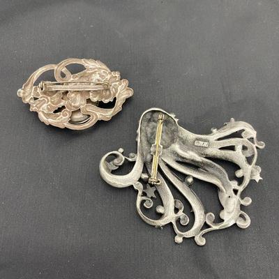 .51. Hummel & Other Pewter Brooches