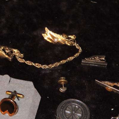Tie clips and pins