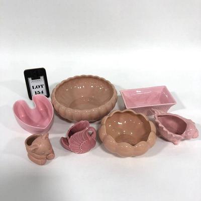 .154. Seven Pink Pottery Pieces
