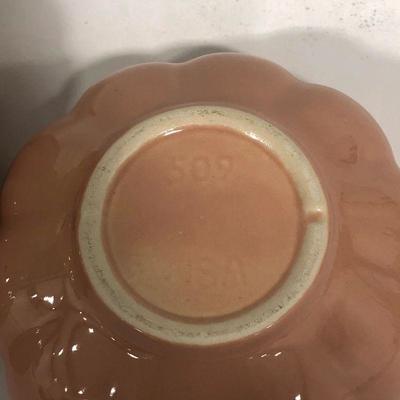 .154. Seven Pink Pottery Pieces