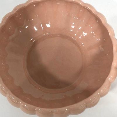 .154. Seven Pink Pottery Pieces