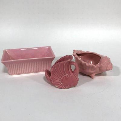 .154. Seven Pink Pottery Pieces