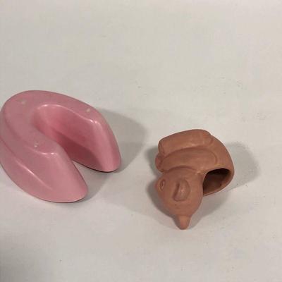 .154. Seven Pink Pottery Pieces