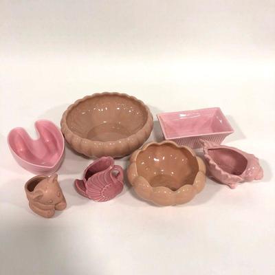 .154. Seven Pink Pottery Pieces