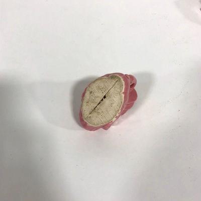 .154. Seven Pink Pottery Pieces