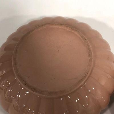 .154. Seven Pink Pottery Pieces