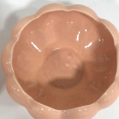 .154. Seven Pink Pottery Pieces