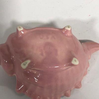 .154. Seven Pink Pottery Pieces