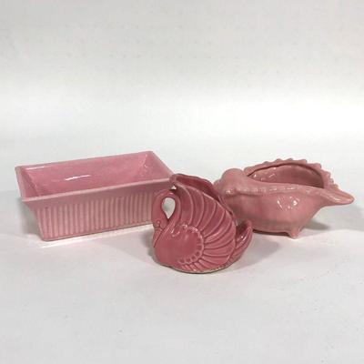 .154. Seven Pink Pottery Pieces