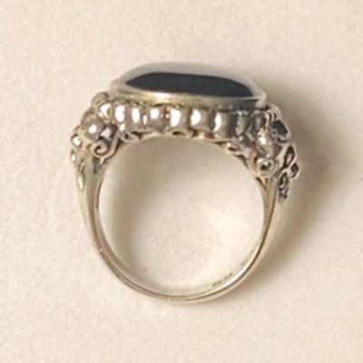 J6:Sterling silver and marcasite ring with large round black onyx center