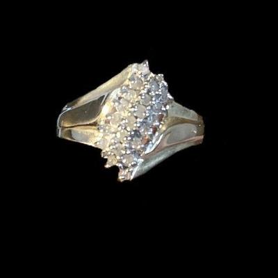 J56: 10k Gold Ring with multiple diamond chips