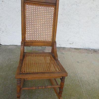 Lot 63 - Nice Antique Walnut and Cane Back and Seat Wooden Rocking Chair