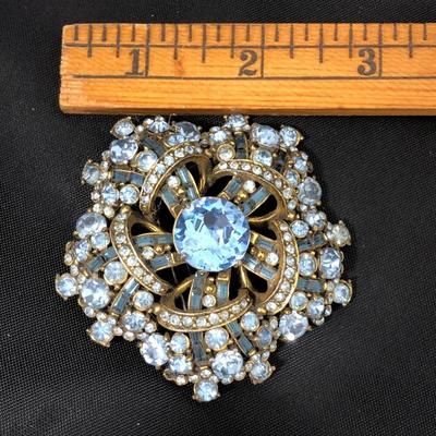 .169. Eisenberg & Holly Craft Brooches