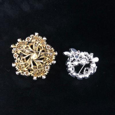 .169. Eisenberg & Holly Craft Brooches