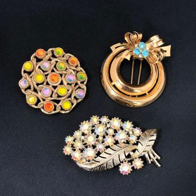 .173. One Dozen Mostly Marked Brooches