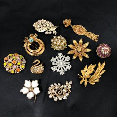 .173. One Dozen Mostly Marked Brooches