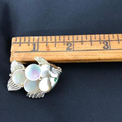 .177. Figural Brooches