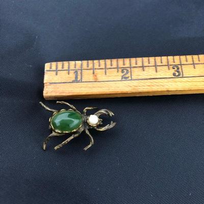 .177. Figural Brooches