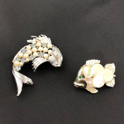 .177. Figural Brooches