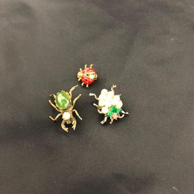 .177. Figural Brooches