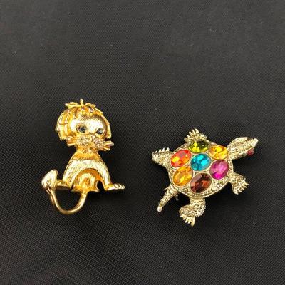 .177. Figural Brooches