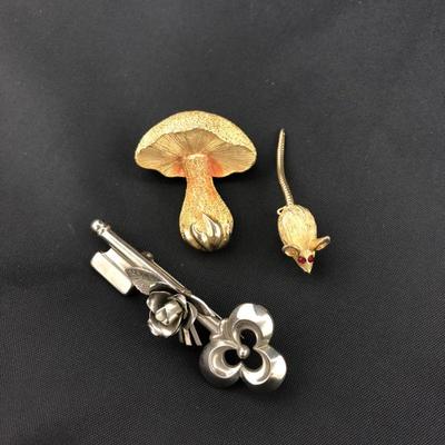 .177. Figural Brooches